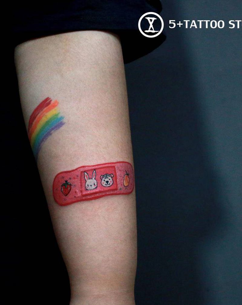 创可贴纹身图片_手臂New School纹身图案