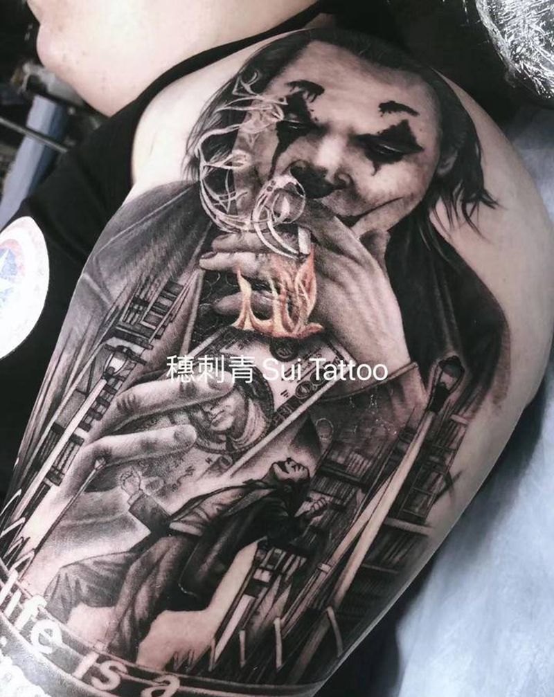 小丑纹身图片_手臂欧美写实纹身图案