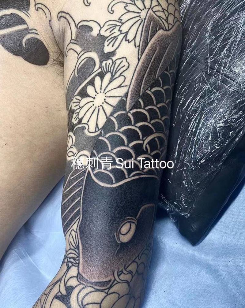 大黑纹身图片_手臂老传统纹身图案