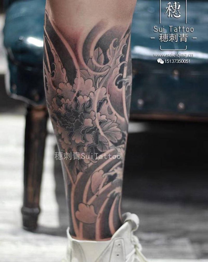 牡丹纹身图片_腿部新传统纹身图案