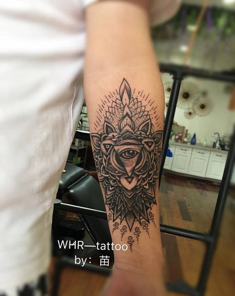 梵花纹身图片_手臂点刺图腾纹身图案