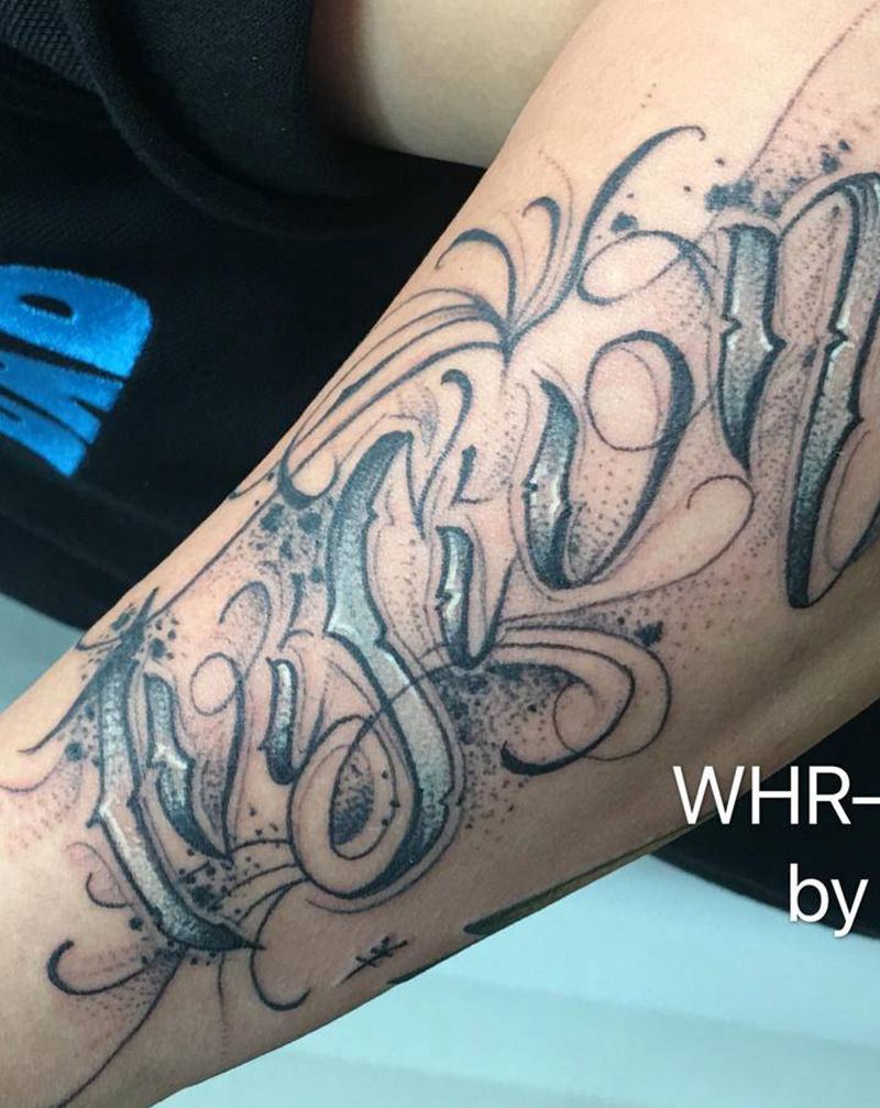 其卡诺纹身图片_手臂花体字纹身图案