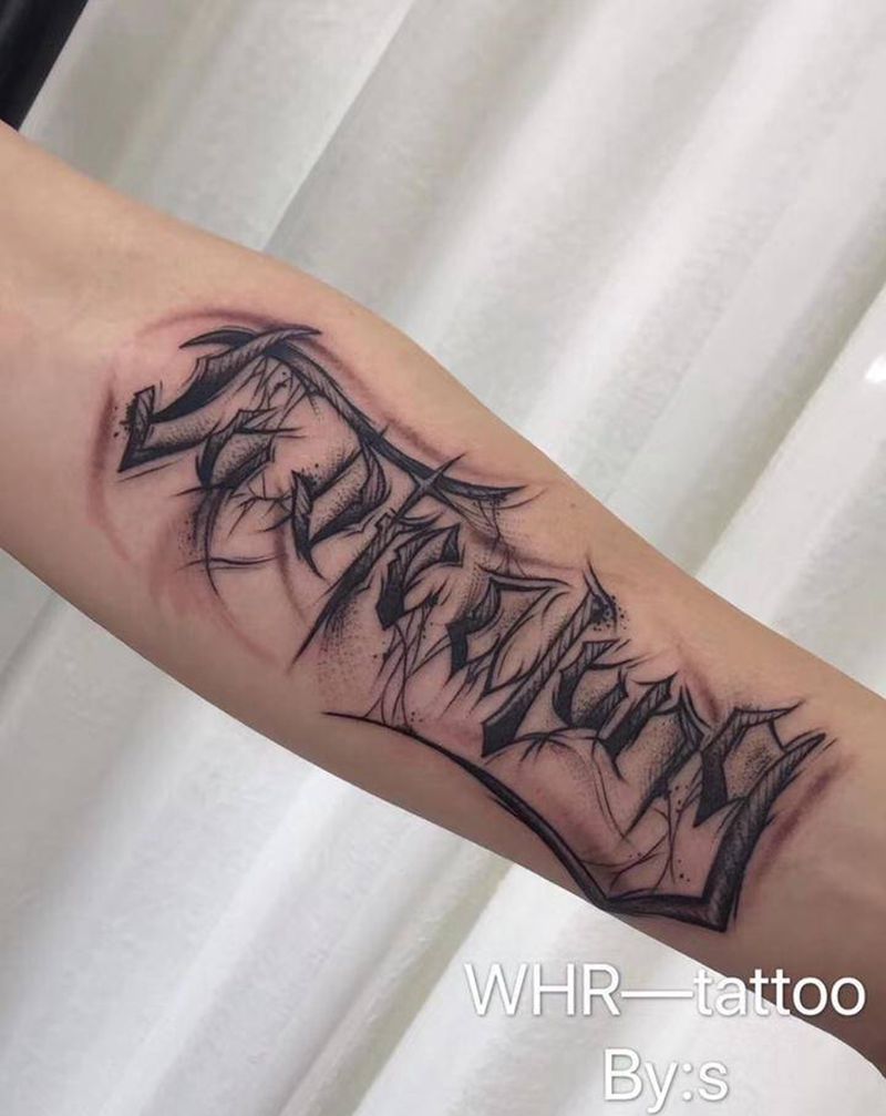 其卡诺纹身图片_手臂花体字纹身图案