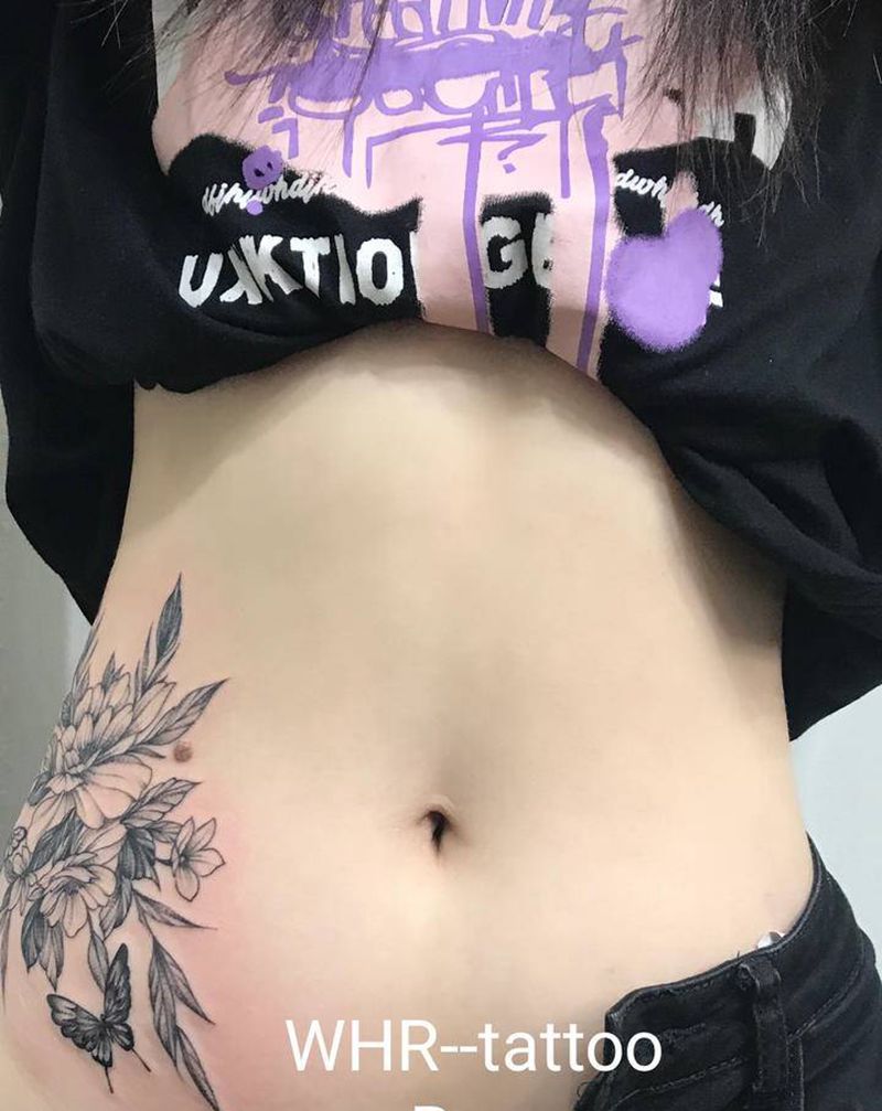 素花纹身图片_腹部点刺新传统纹身图案