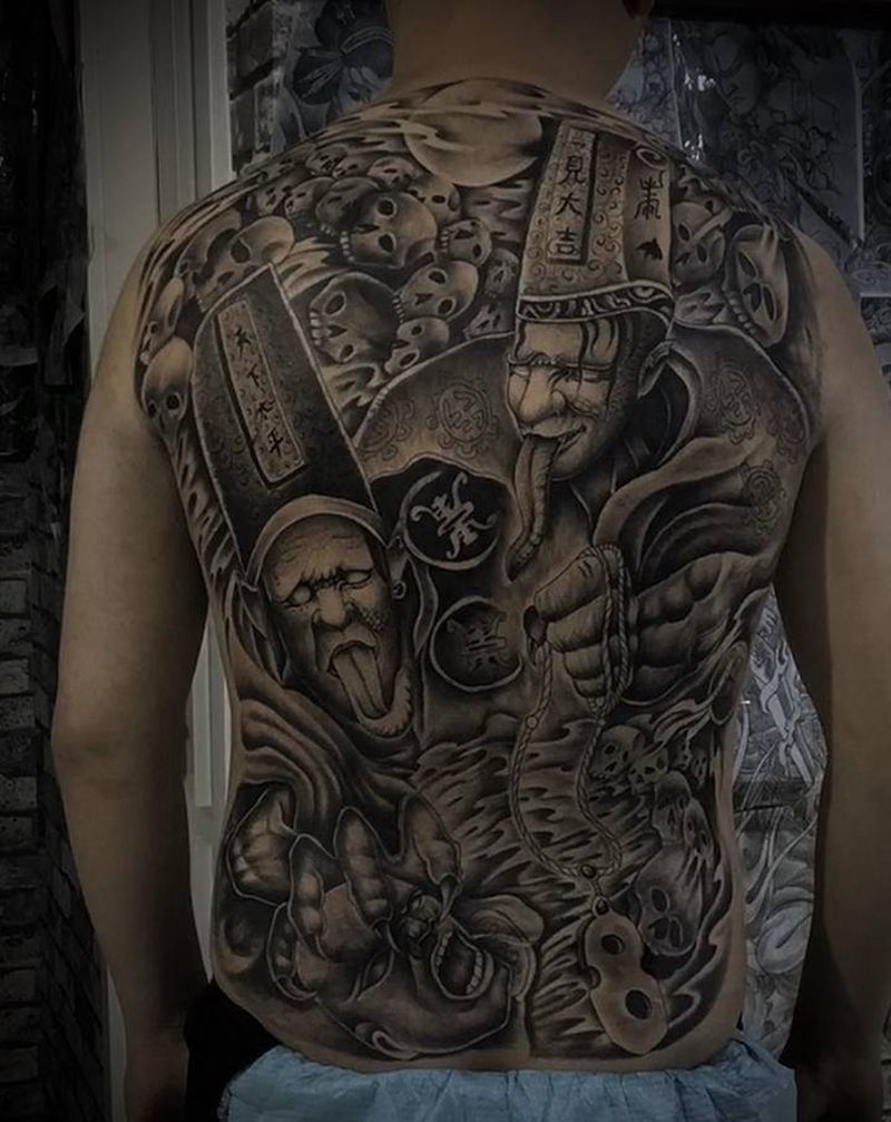 黑白无常纹身图片_背部纹身图案