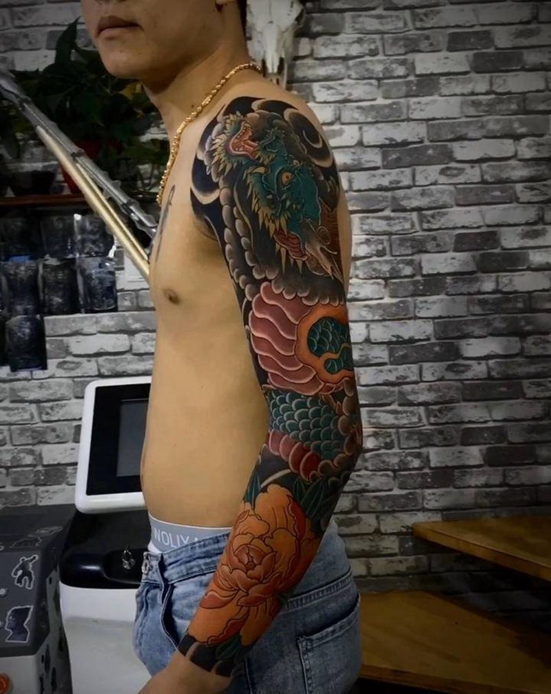 传统龙纹身图片_手臂纹身图案