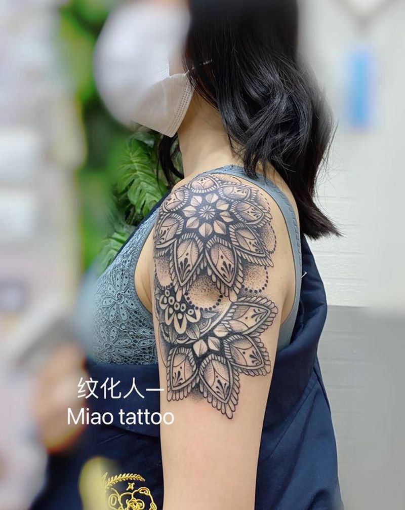 梵花纹身图片_肩部手臂点刺图腾纹身图案