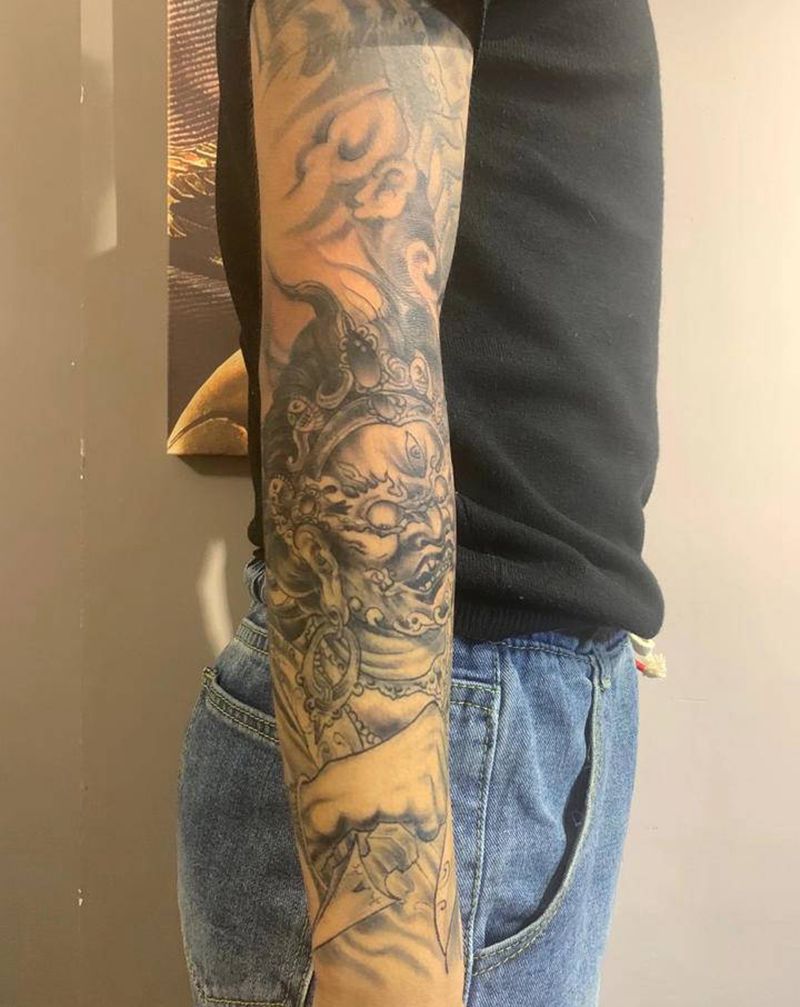 小臂大黑天纹身图片_手臂新传统纹身图案