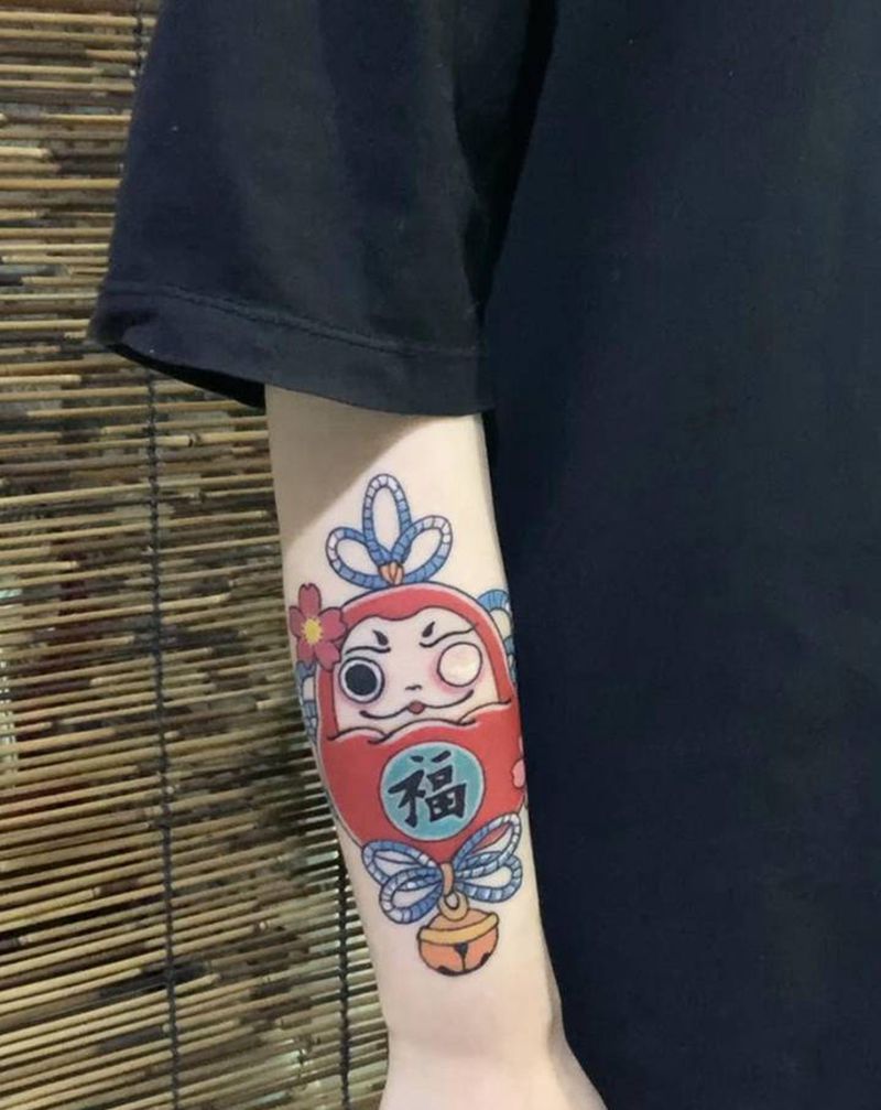 达摩蛋纹身图片_手臂纹身图案