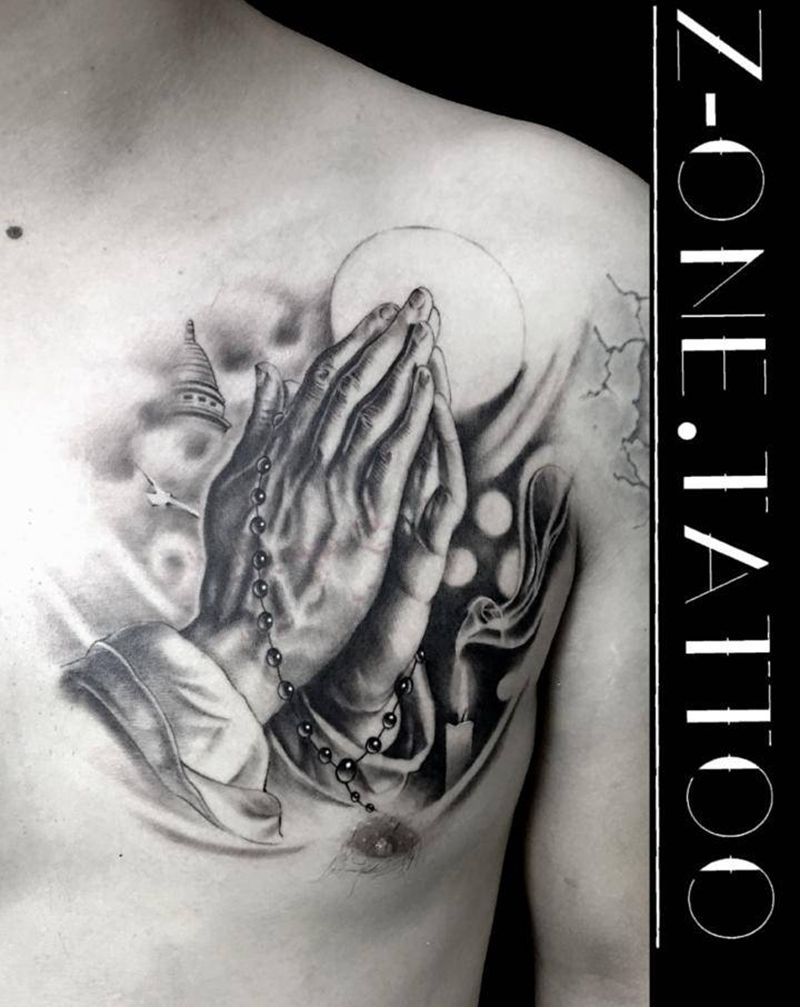 《祈祷之手》纹身图片_胸部欧美写实纹身图案