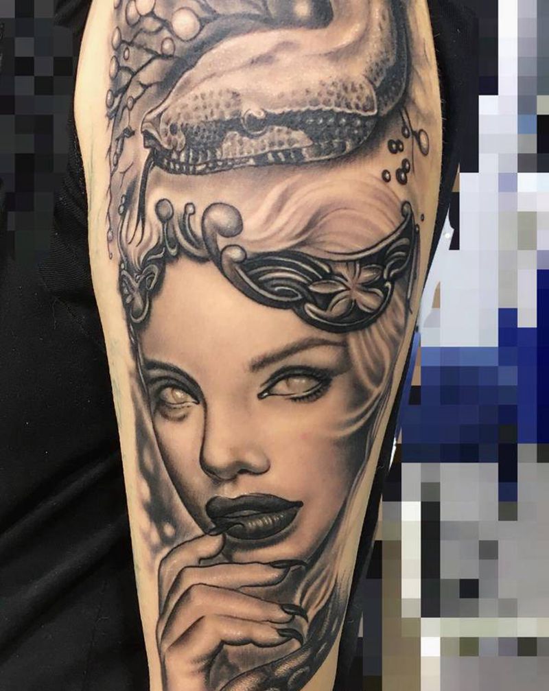 石化的眼纹身图片_手臂欧美写实纹身图案