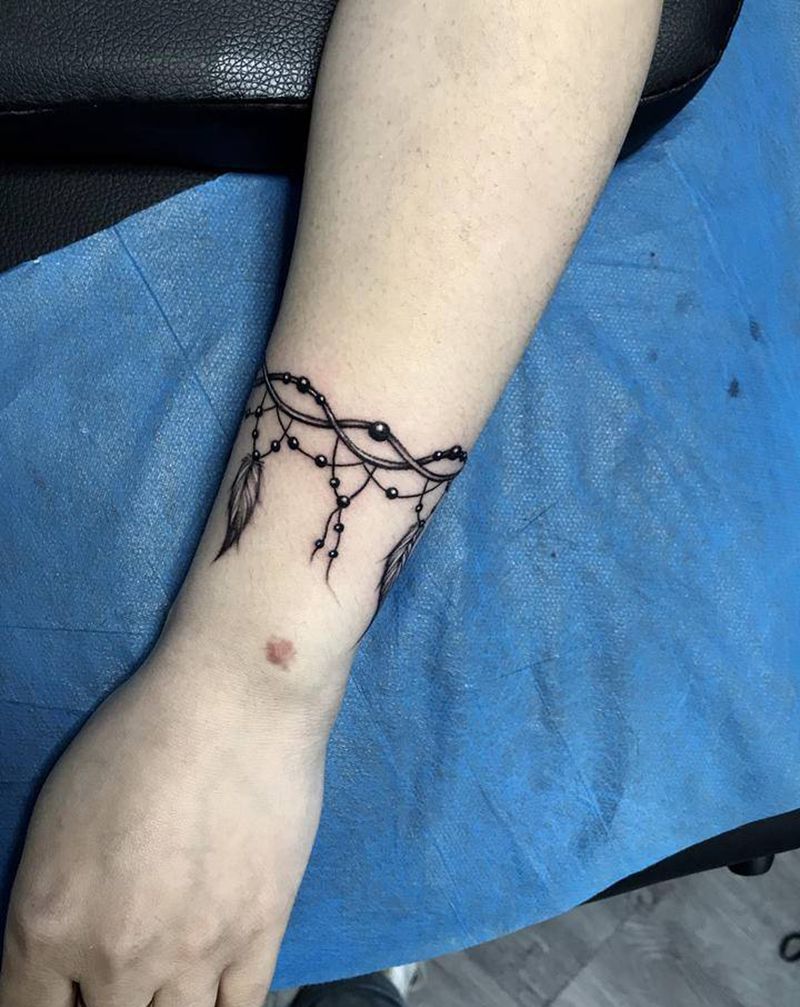 臂环纹身图片_手臂清新羽毛纹身图案