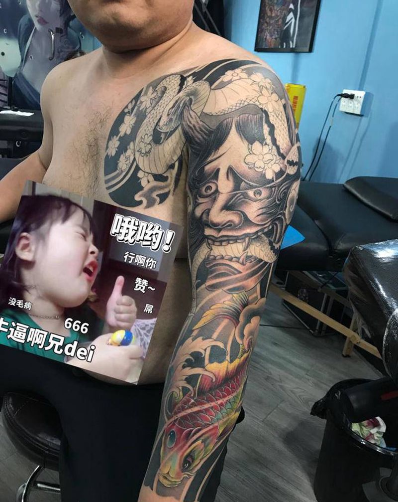 花臂纹身图片_胸部手臂新传统纹身图案