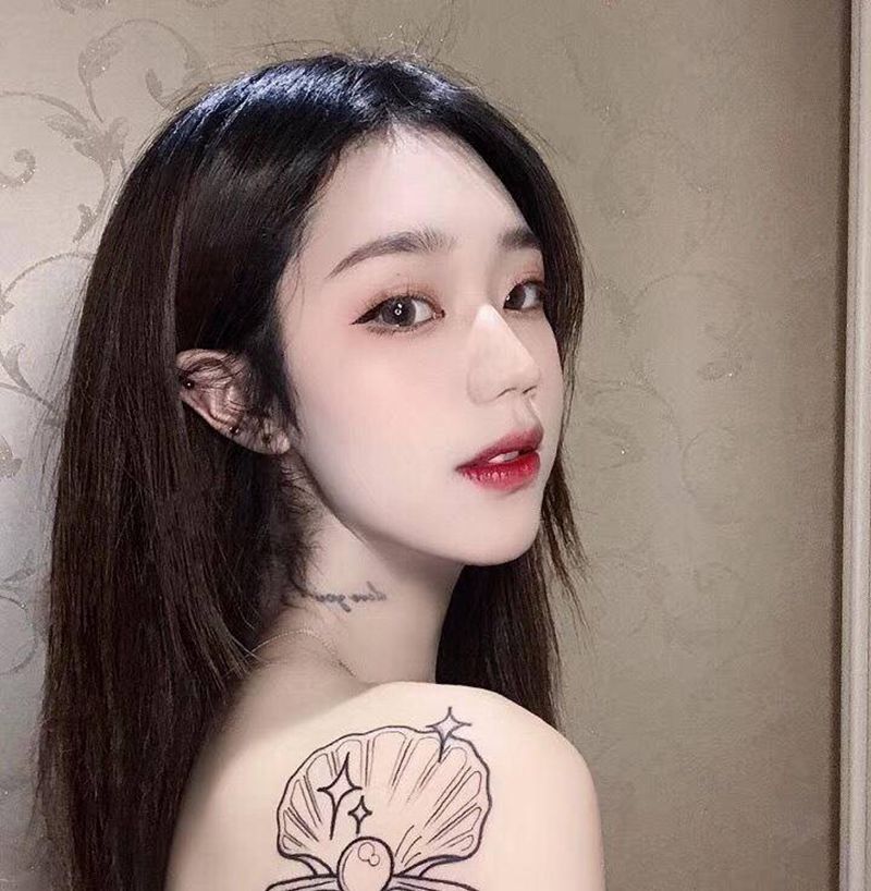 许昌沄刺青纹身图片_肩部贝壳纹身图案