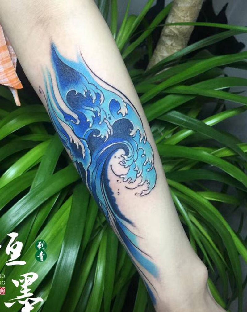 浪里格浪纹身图片_手臂水彩纹身图案