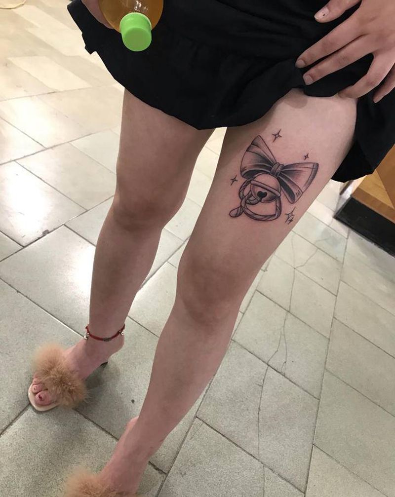 蝴蝶结纹身图片_腿部小清新纹身图案