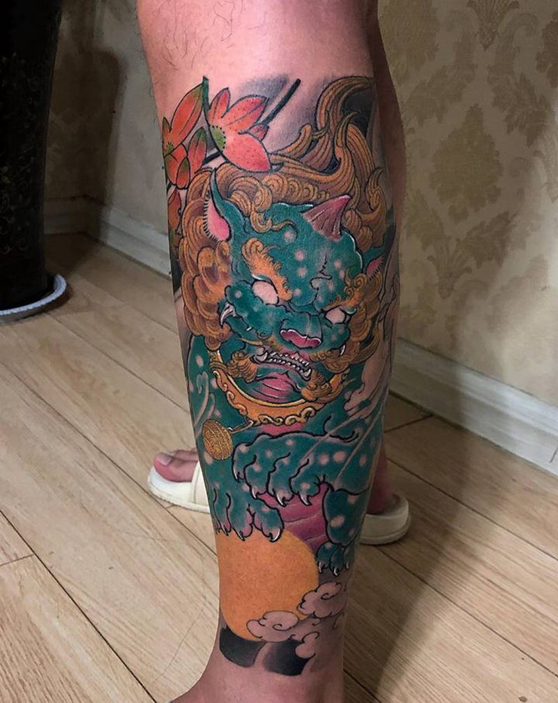 唐狮牡丹纹身图片_腿部新传统纹身图案