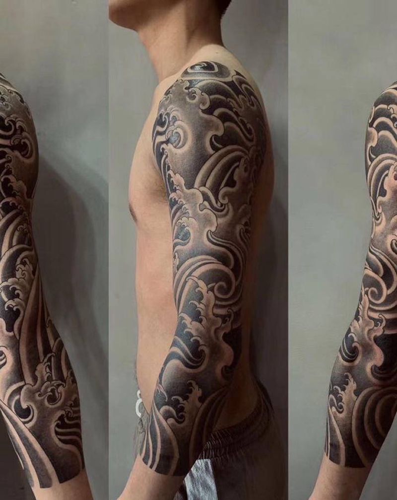 水浪花臂纹身图片_手臂老传统纹身图案