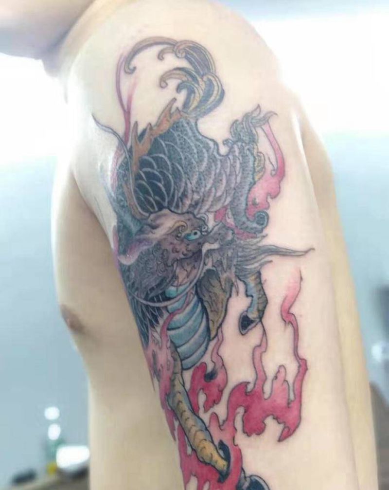 麒麟纹身图片_手臂新传统纹身图案