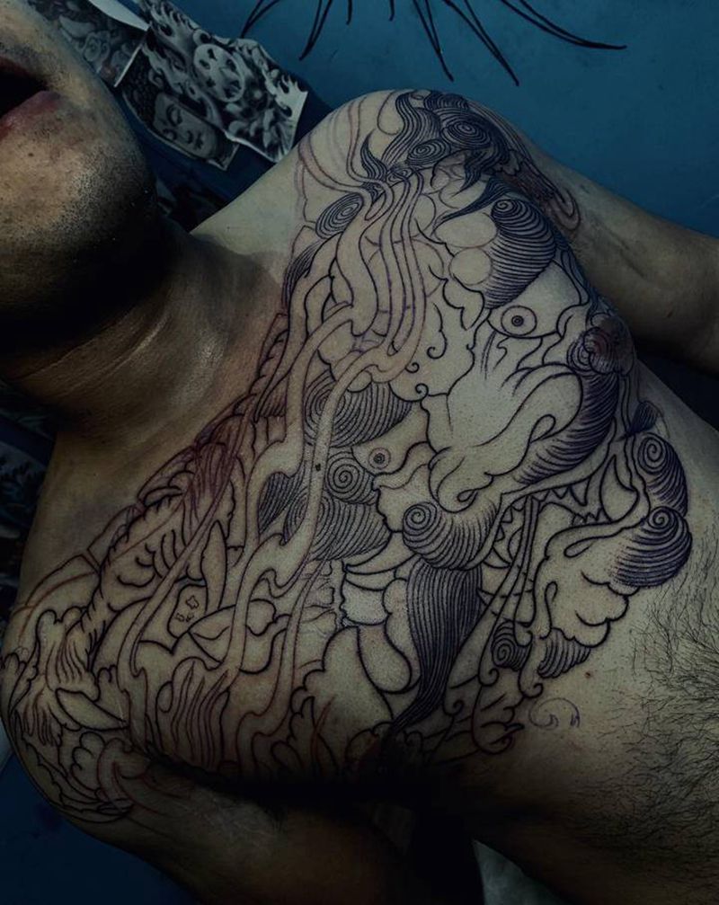 唐狮花胸纹身图片_胸部新传统老传统唐狮花胸纹身图案