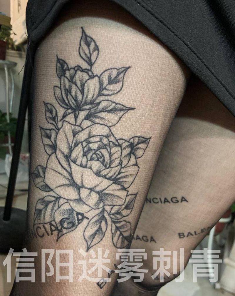 素花纹身图片_腿部纹身图案