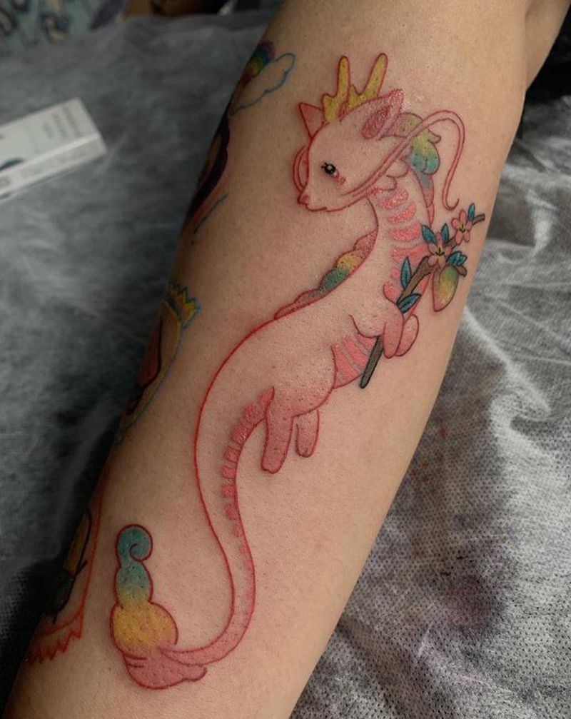 卡通龙纹身图片_手臂水彩龙纹身图案