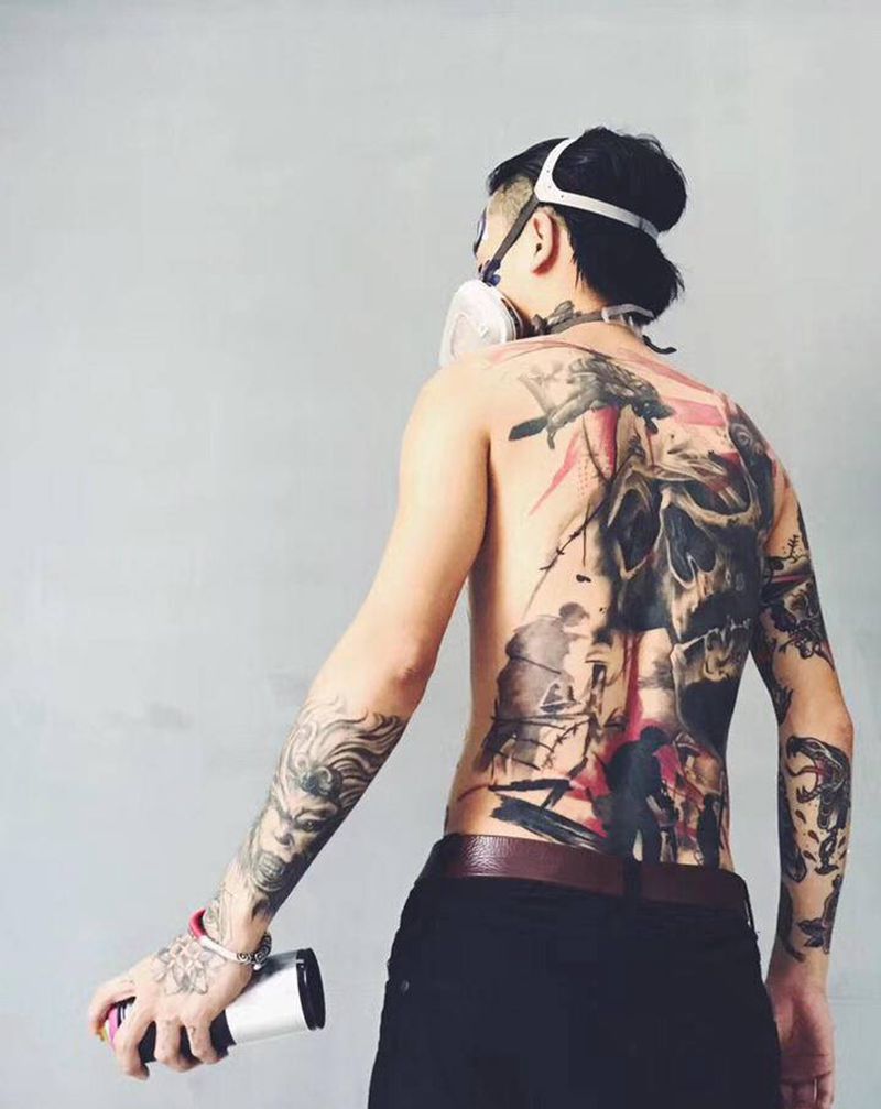 反战满背纹身图片_背部臀部水墨水彩纹身图案