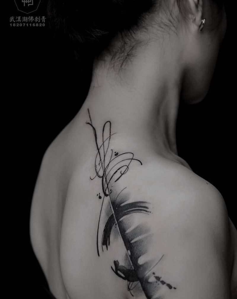 无所畏惧纹身图片_肩部手臂水墨水彩纹身图案