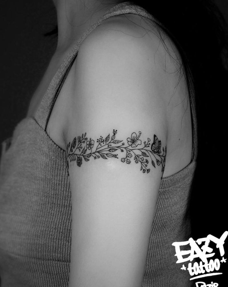 花环纹身图片_手臂手部New School花花环臂环纹身图案