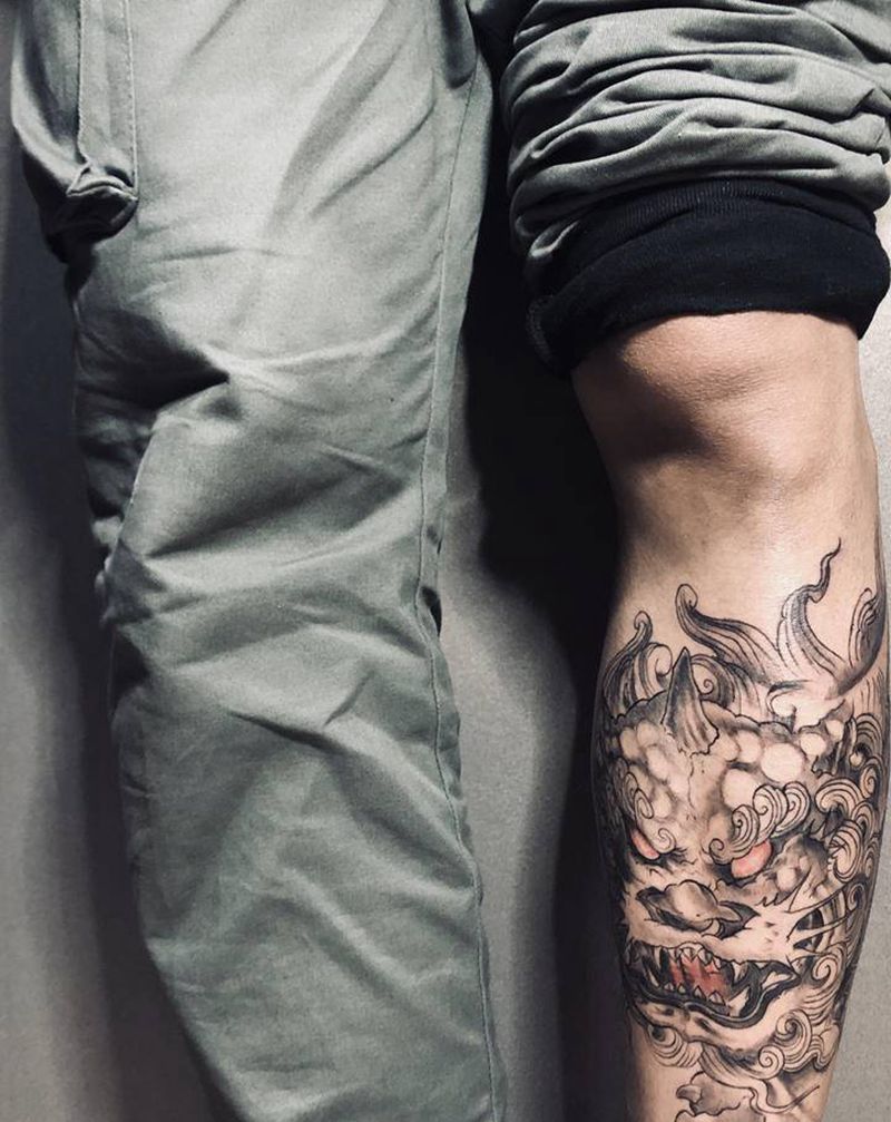 唐狮纹身图片_腿部纹身图案