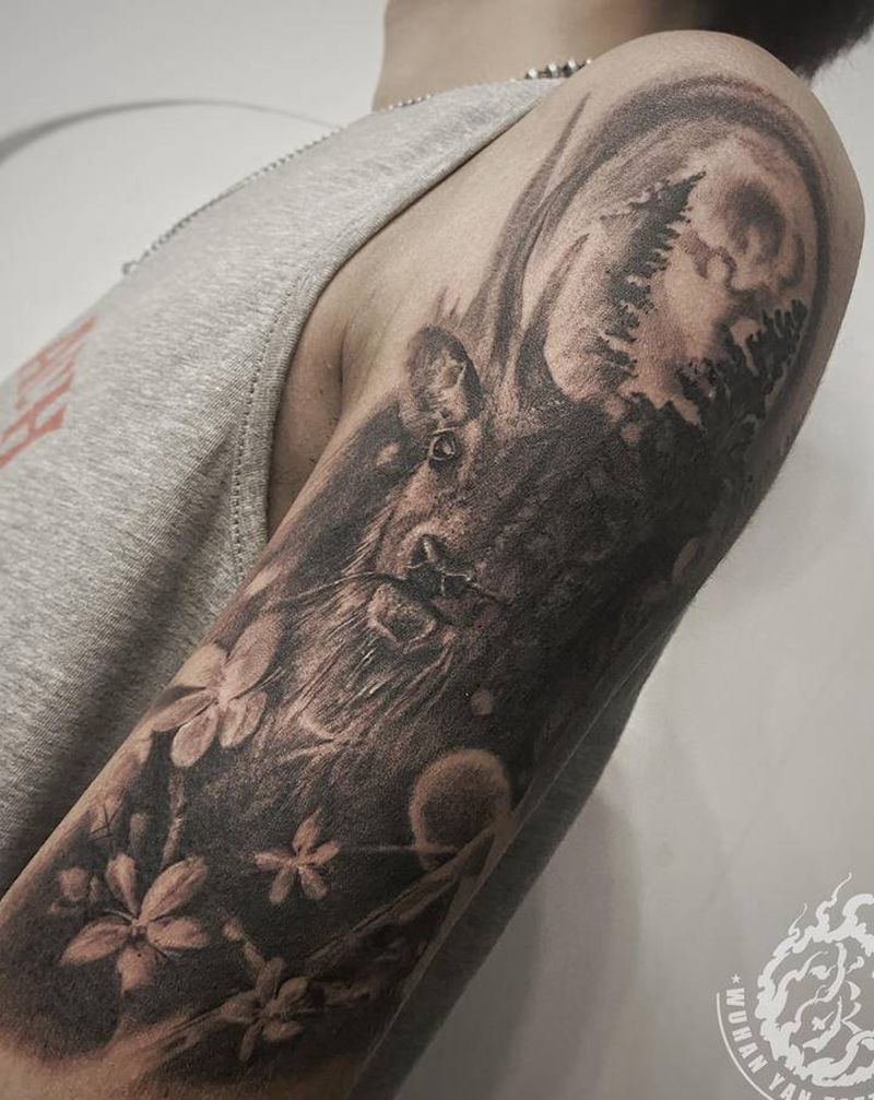 逐鹿纹身图片_肩部手臂欧美写实纹身图案