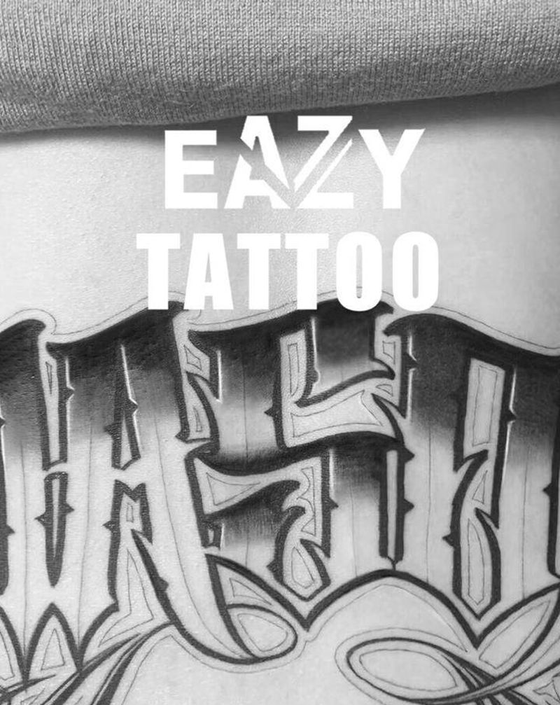 花体字纹身图片_腰部花体字花体字名字纹身图案