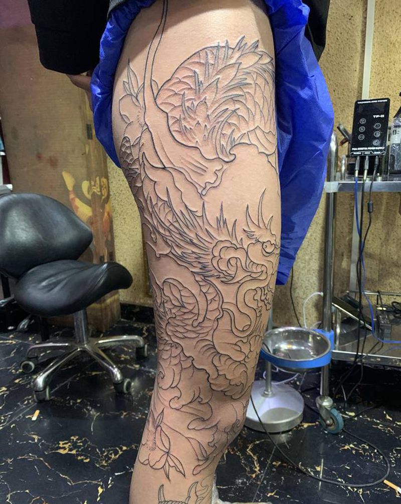 大腿龙线条纹身图片_腿部纹身图案