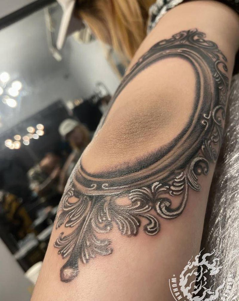 镜.纹身图片_手臂欧美写实纹身图案