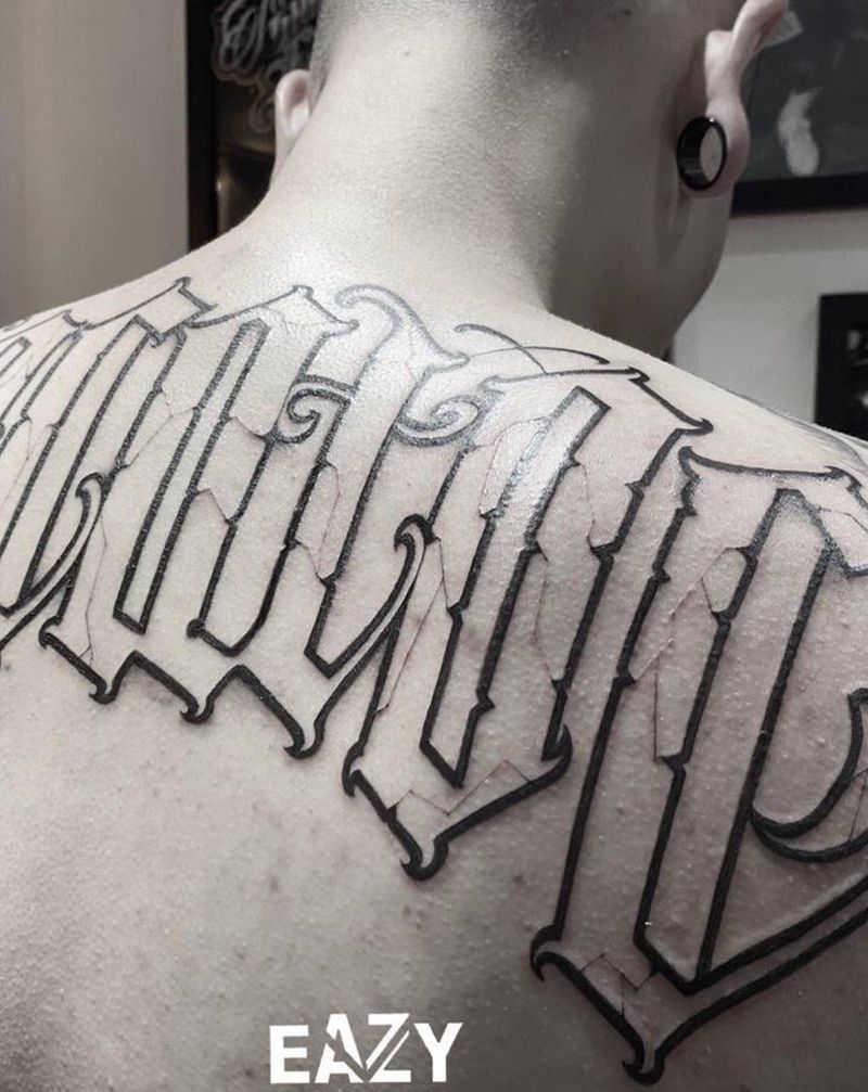 未完纹身图片_背部花体字花体字纹身图案