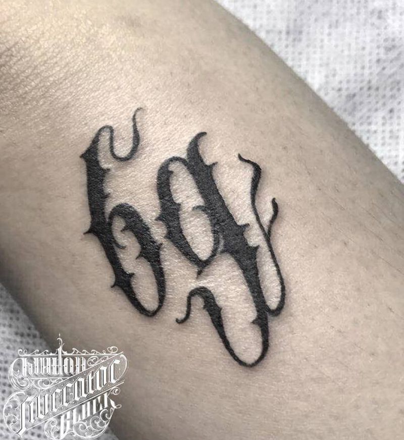 数字纹身图片_手臂花体字花体字纹身图案