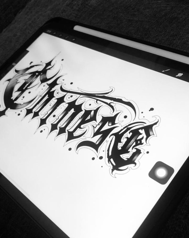 花体字设计纹身图片_手臂花体字纹身图案