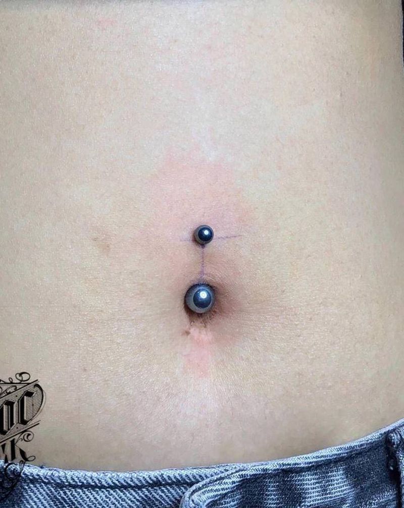 近日穿孔纹身图片_几何纹身图案