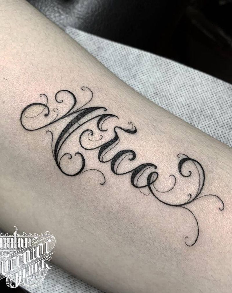 UVB2纹身图片_手臂花体字纹身图案