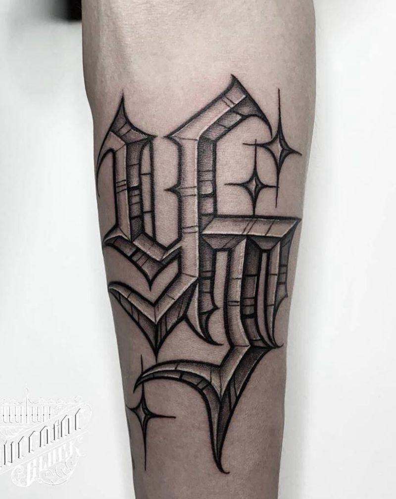 UVB2纹身图片_手臂花体字纹身图案