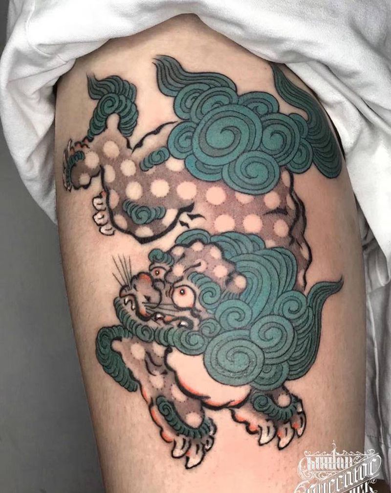 唐狮子纹身图片_腿部老传统新传统唐狮纹身图案