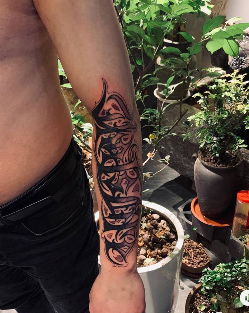 花体英文纹身图片_手臂花体字纹身图案