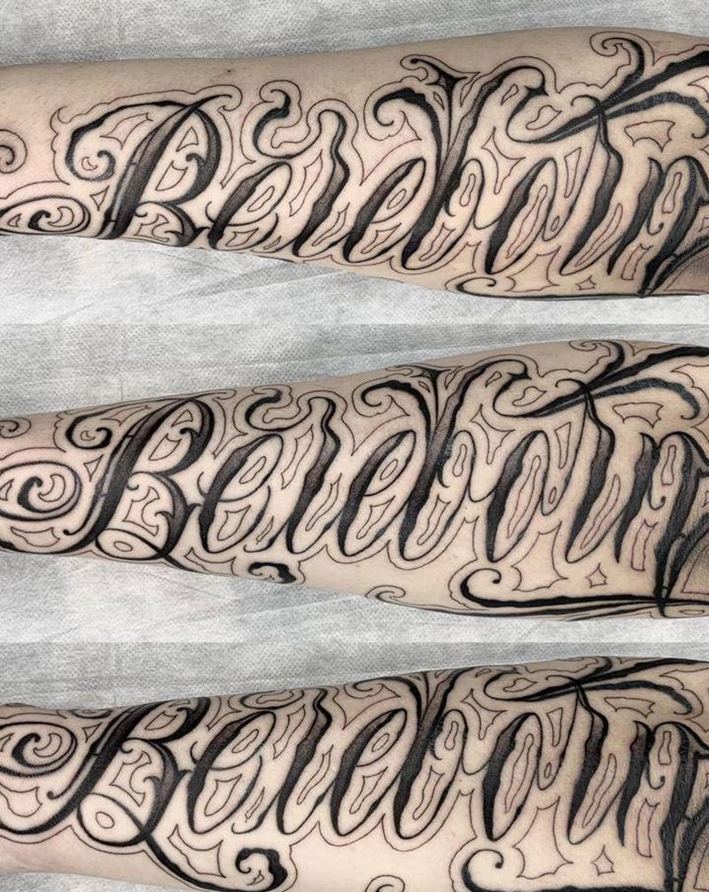 UVB2纹身图片_手臂花体字纹身图案