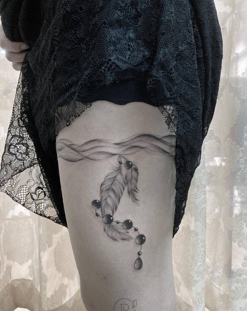 大腿腿环羽毛纹身纹身图片_腿部小清新羽毛纹身图案