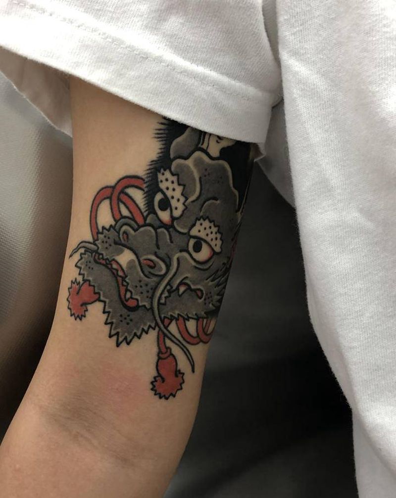 袖里藏龙纹身图片_手臂手部老传统新传统龙纹身图案