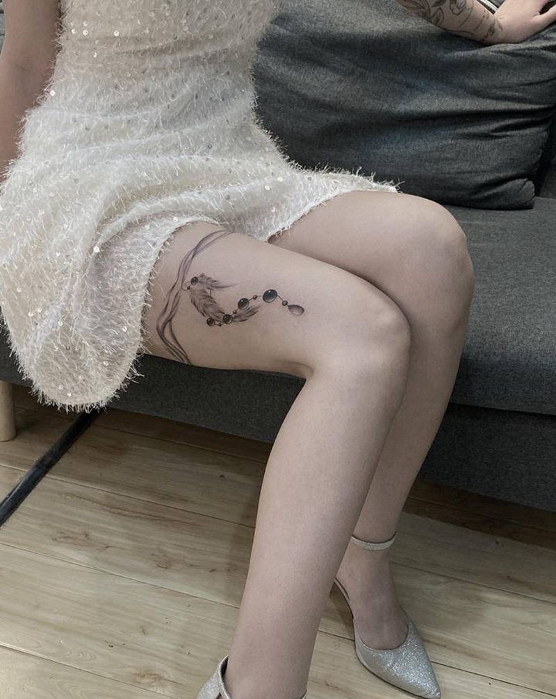 小清新大腿纹身腿环羽毛纹身图片_腿部小清新纹身图案