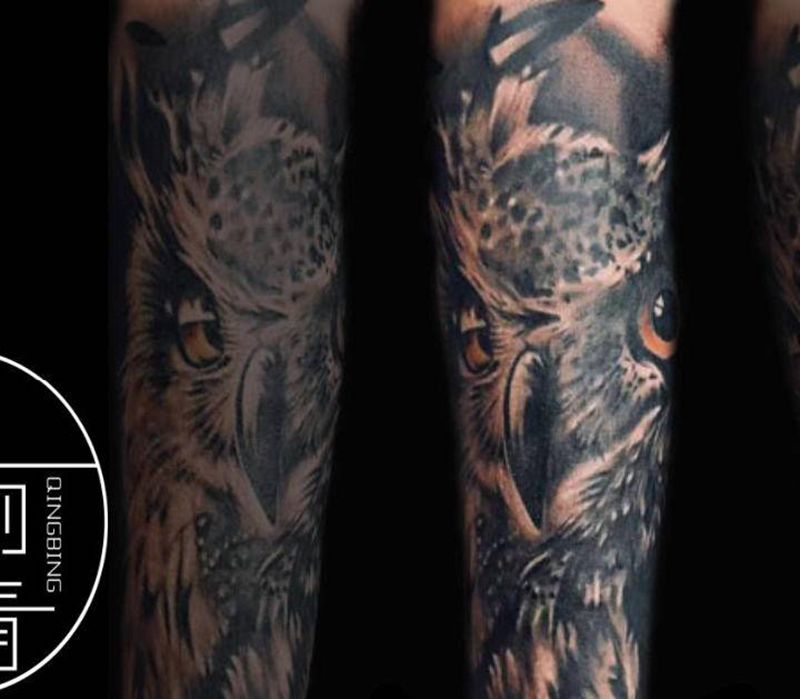 写实猫头鹰作品纹身图片_手臂欧美写实猫头鹰纹身图案