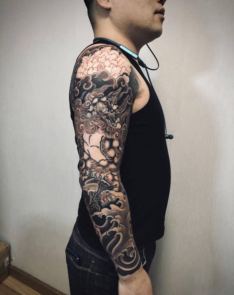 花臂唐狮未完待续纹身图片_手部手臂新传统老传统唐狮纹身图案