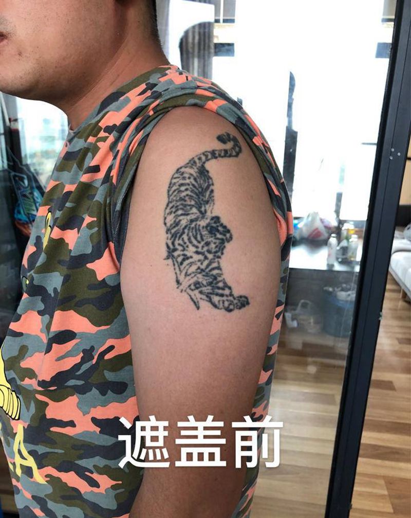 麒麟盖老虎纹身图片_手部手臂老传统新传统遮盖 麒麟纹身图案