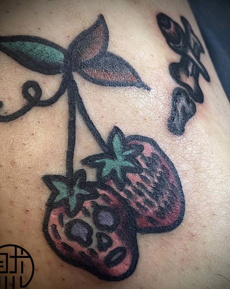 草莓鬼脸纹身图片_腿部Old School纹身图案